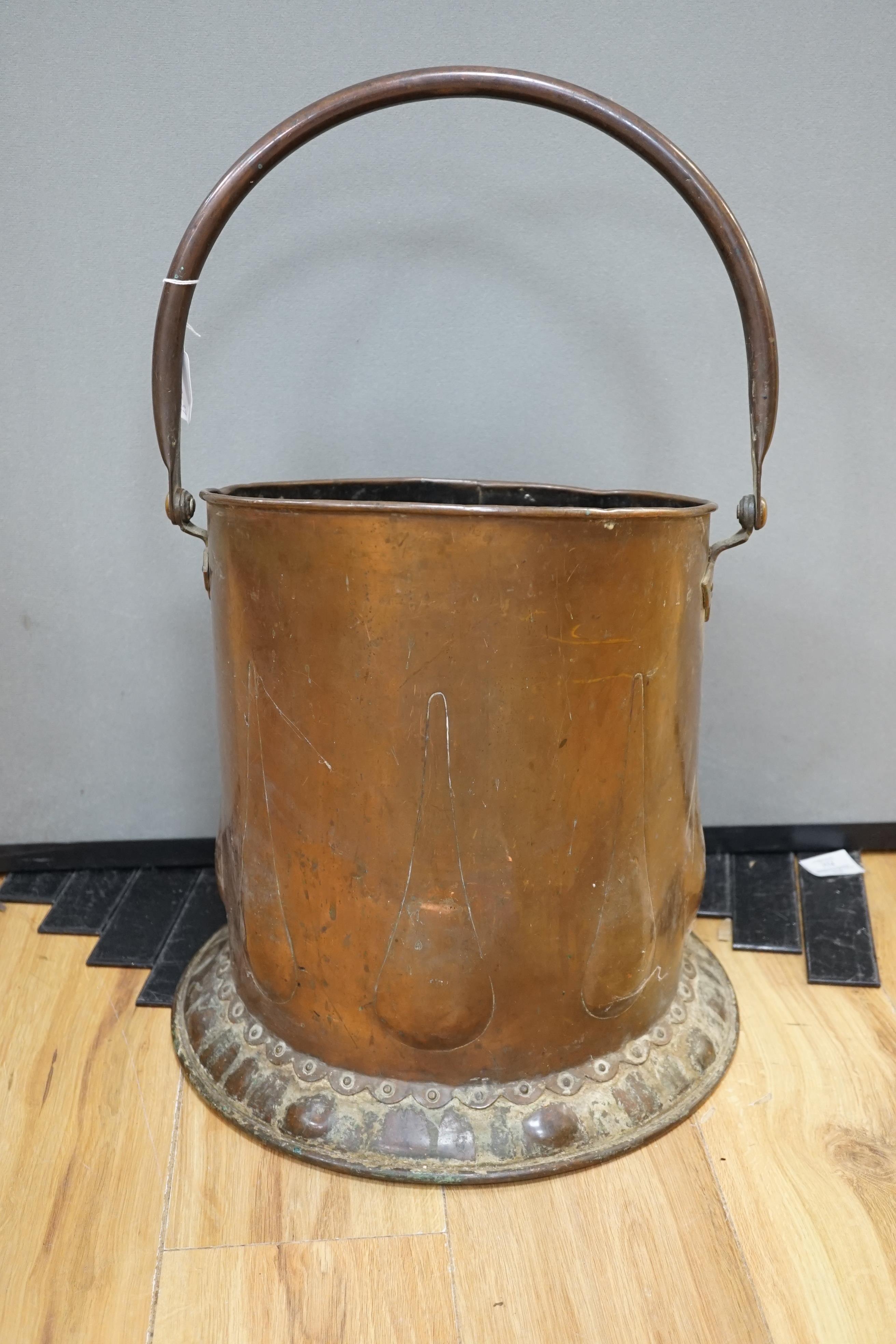 An Arts and Crafts copper coal scuttle, c.1900, 40cm